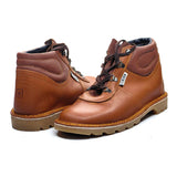 Pair of red tan leather boots on a white background