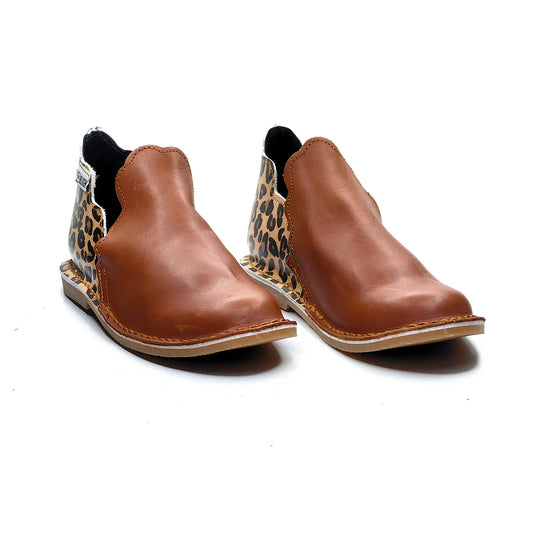 Pair of brown leather boots with leopard print accents on a white background