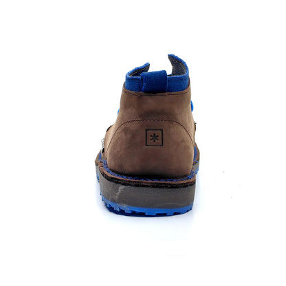 Brown shoe with blue sole on a white background