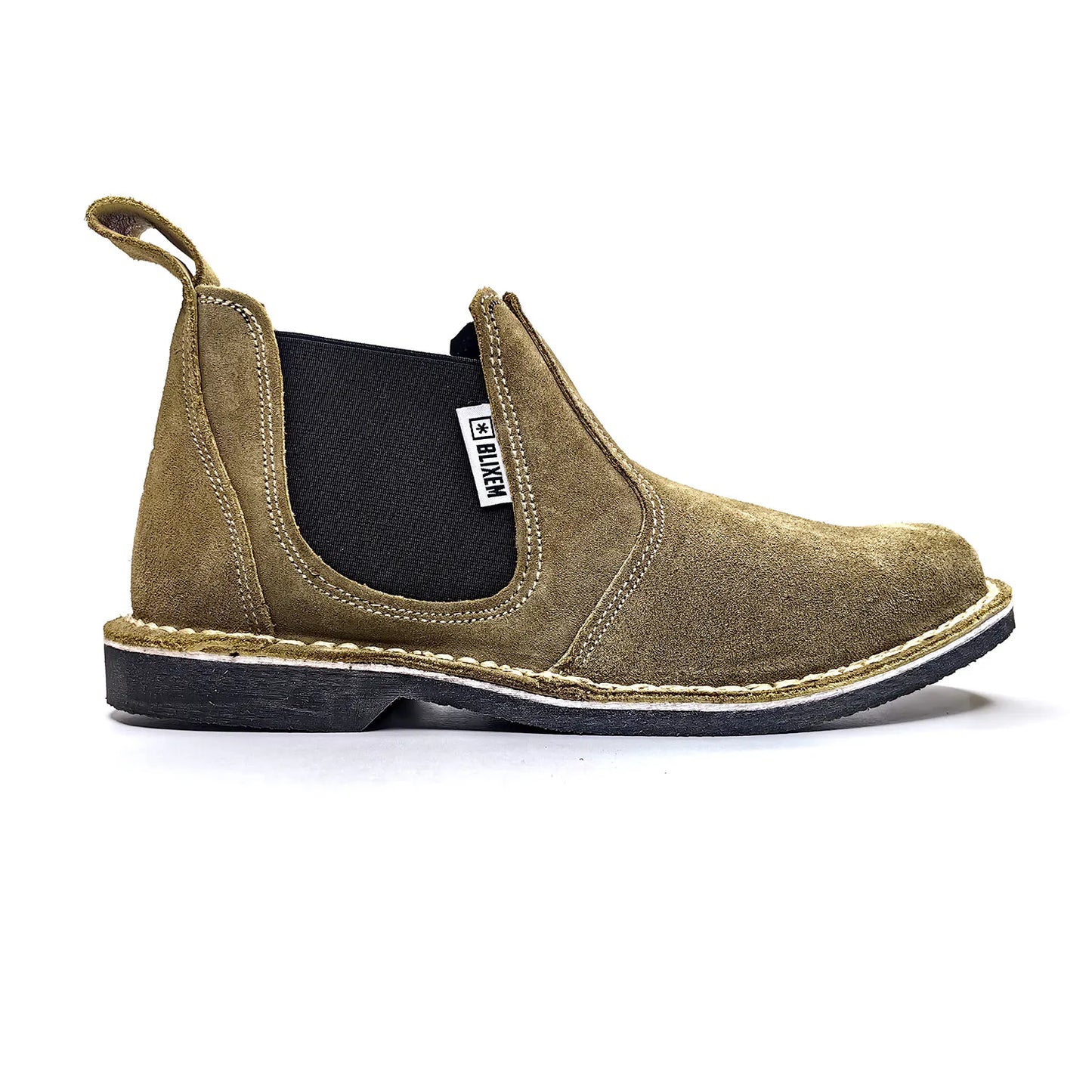 Brown slip-on shoe with black sole on a white background