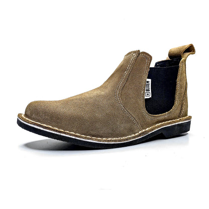 Brown Chelsea boot with a visible brand label on a white background