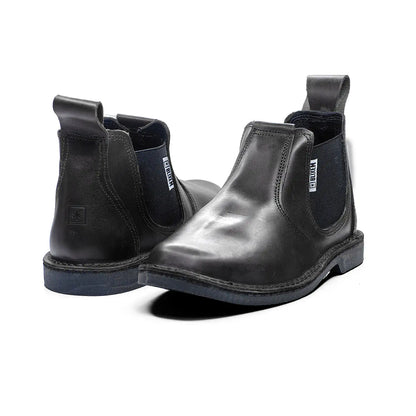 Pair of black leather Chelsea boots on a white background