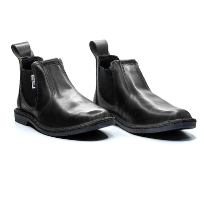 Pair of black leather Chelsea boots on a white background