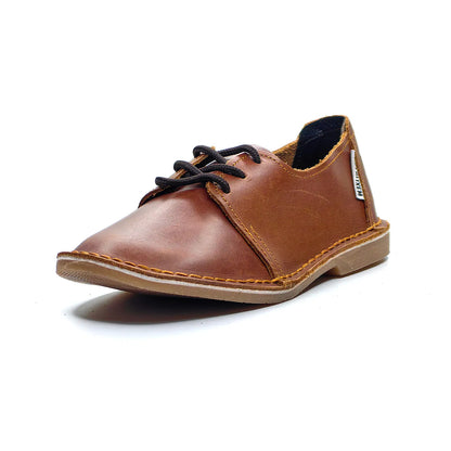 Brown leather shoe with black laces on a white background