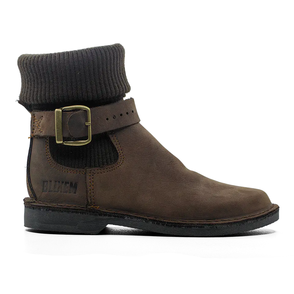 Brown leather boot with a buckle on a white background