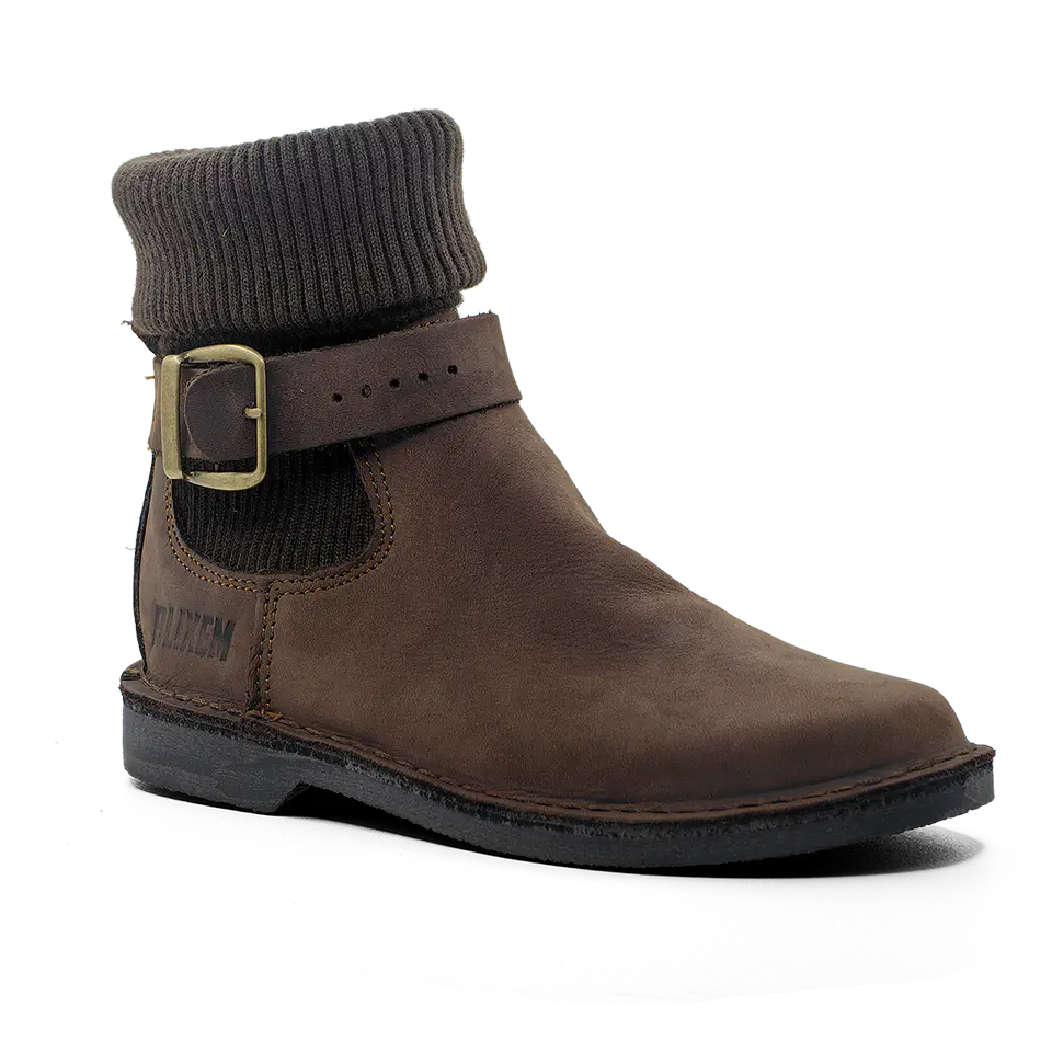 Brown leather boot with a buckle on a white background